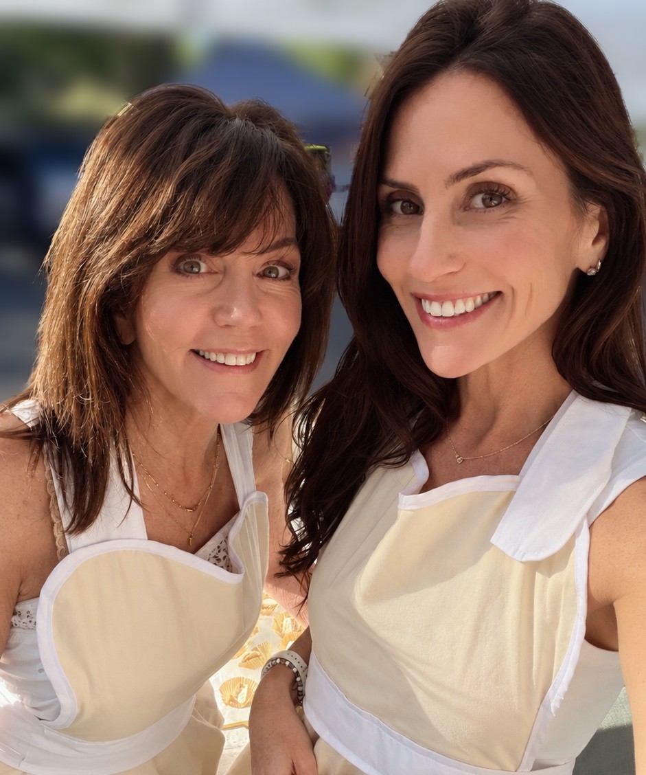 Nikki and her mom Linda in their Crème & Crumbles aprons